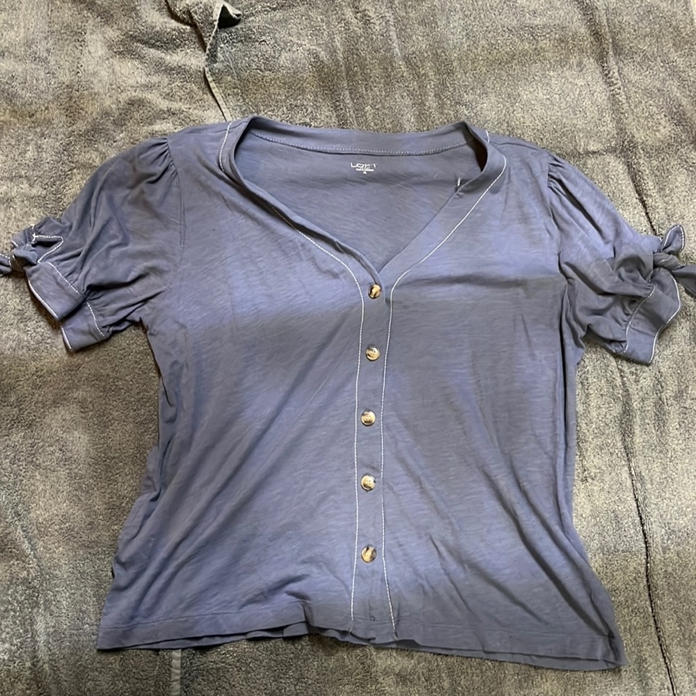 Greyish purple button up with ties on the sleeve